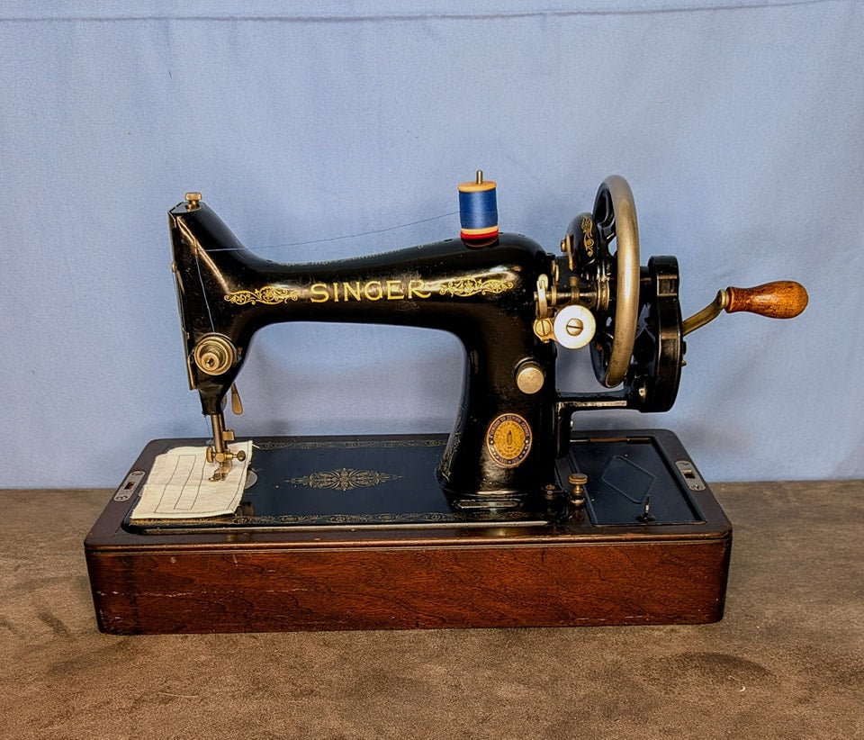 A 1950 Singer 99k Bentwood Handcrank Centennial